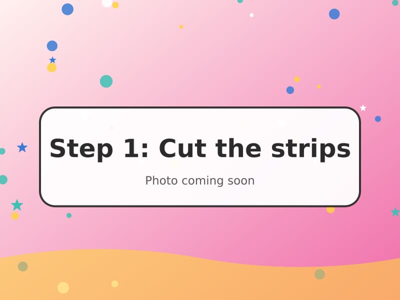 Strips of green and yellow paper cut ready for a paper chain